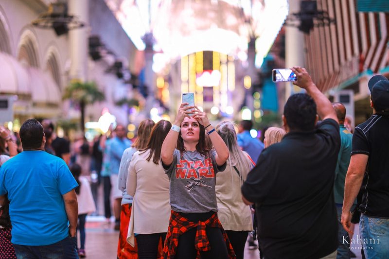 Crowd under the neon canopy on Fremont Street
